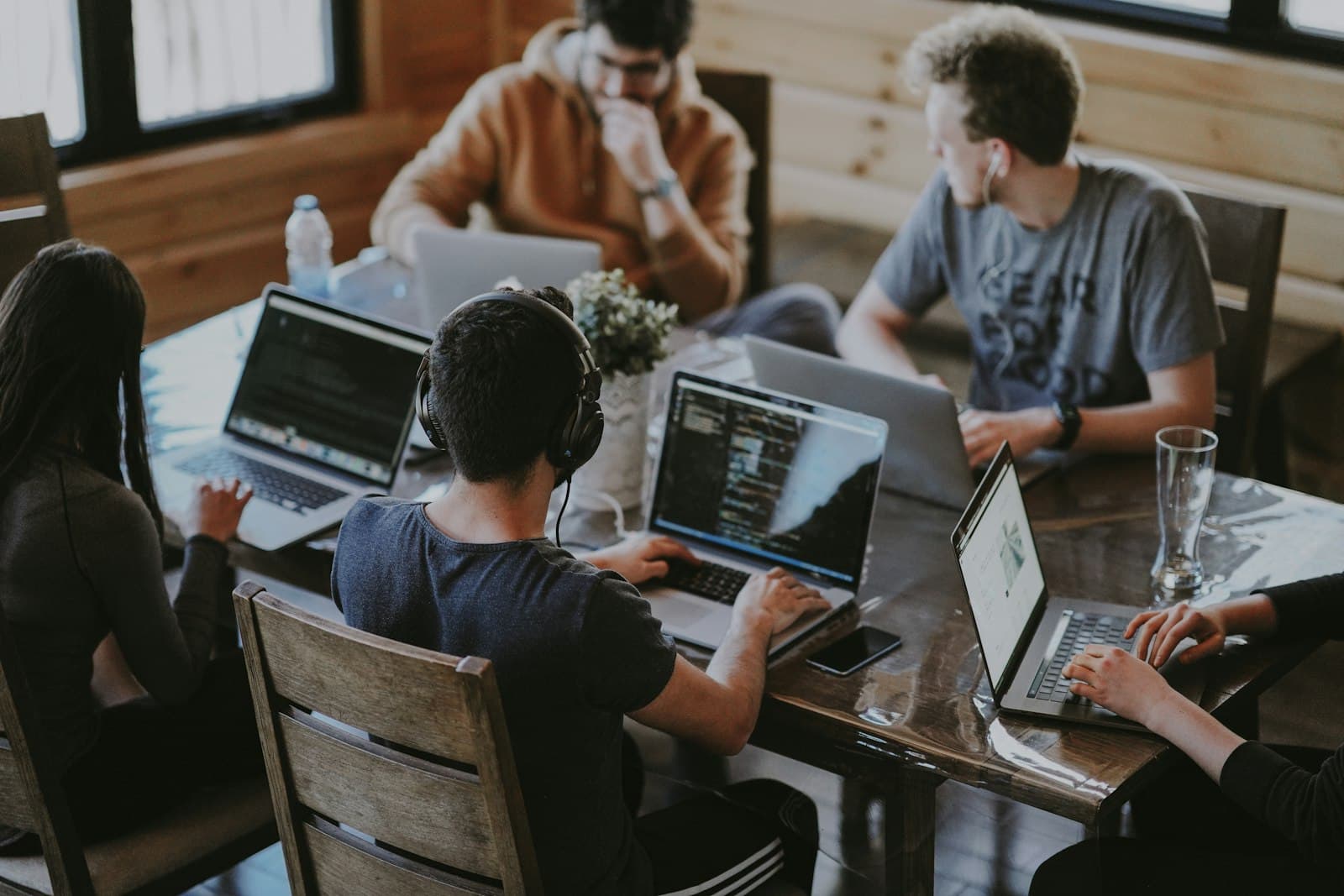 Lead buyers reviewing campaign results together around a shared workspace.